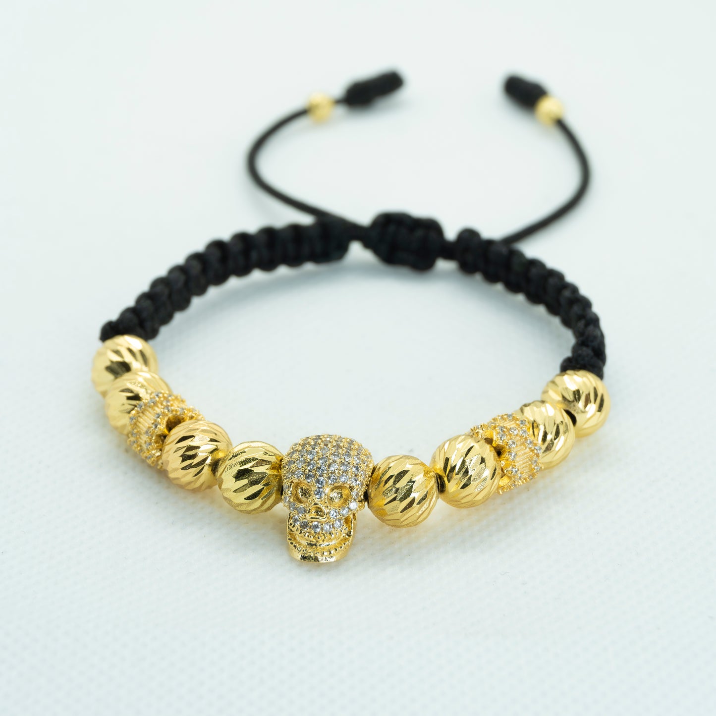 PULSERA TEJIDA CON DIJE CALAVERA CIRCONES