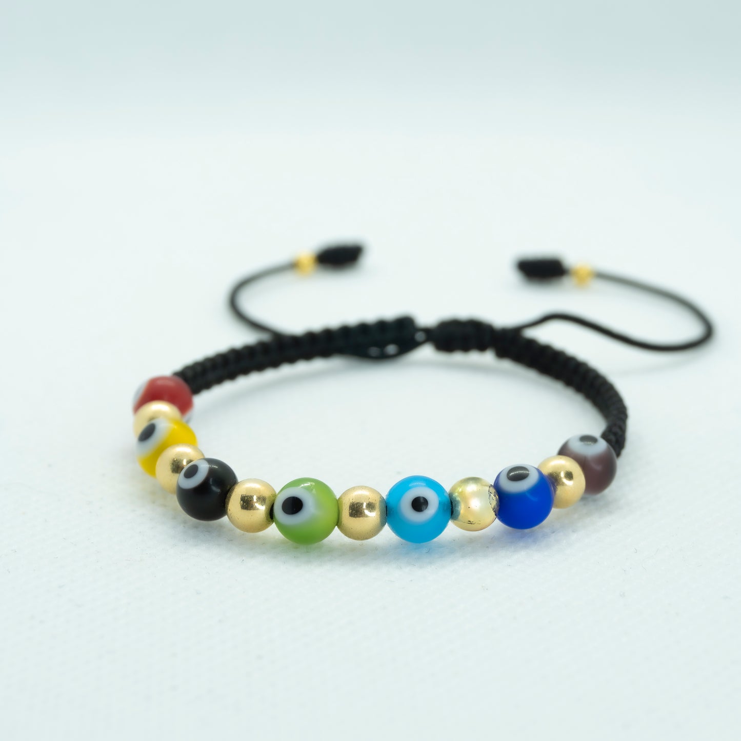 PULSERA TEJIDA CON OJO TURCO