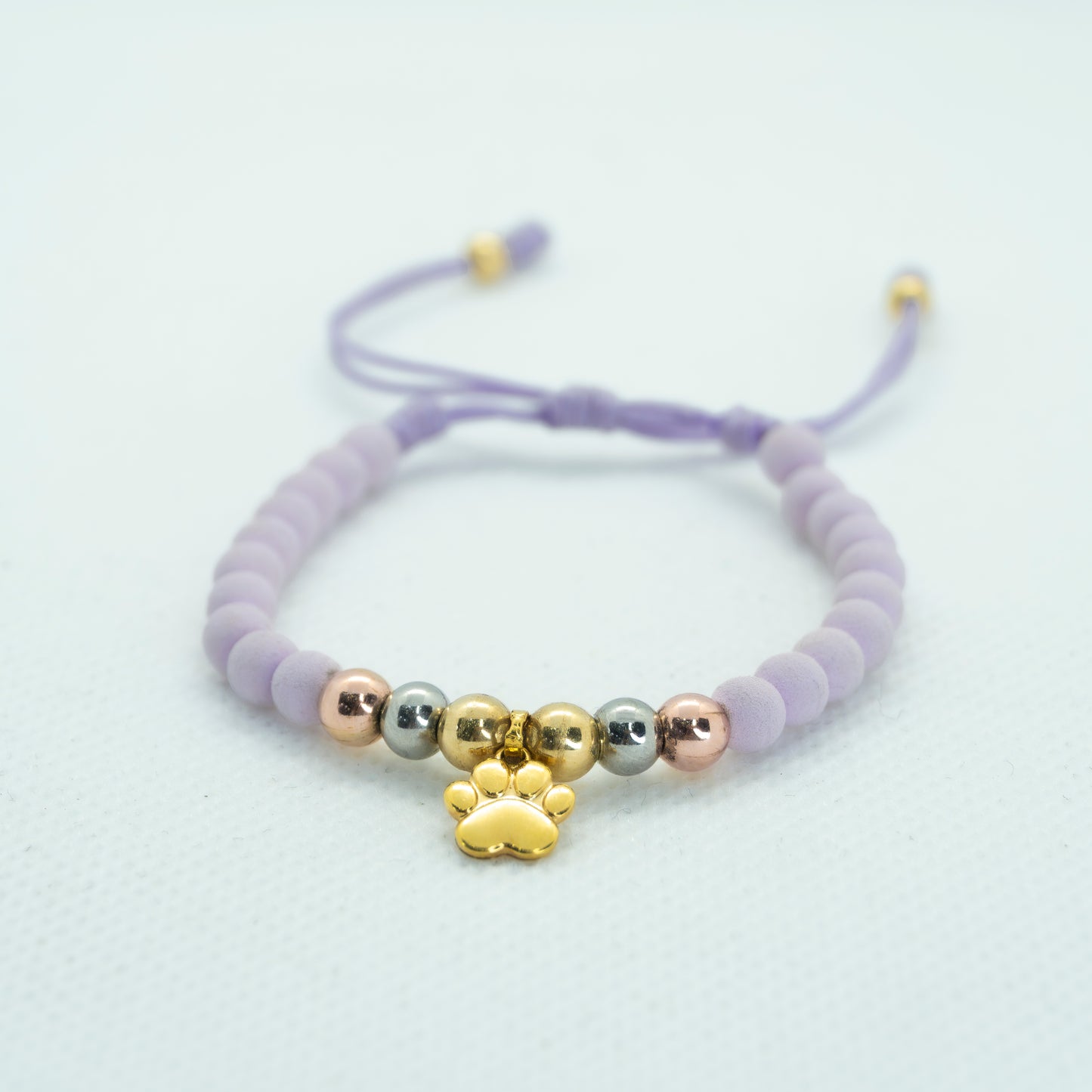 PULSERA CON NEOPRENO BALIN 3 ORO Y DIJE HUELLA