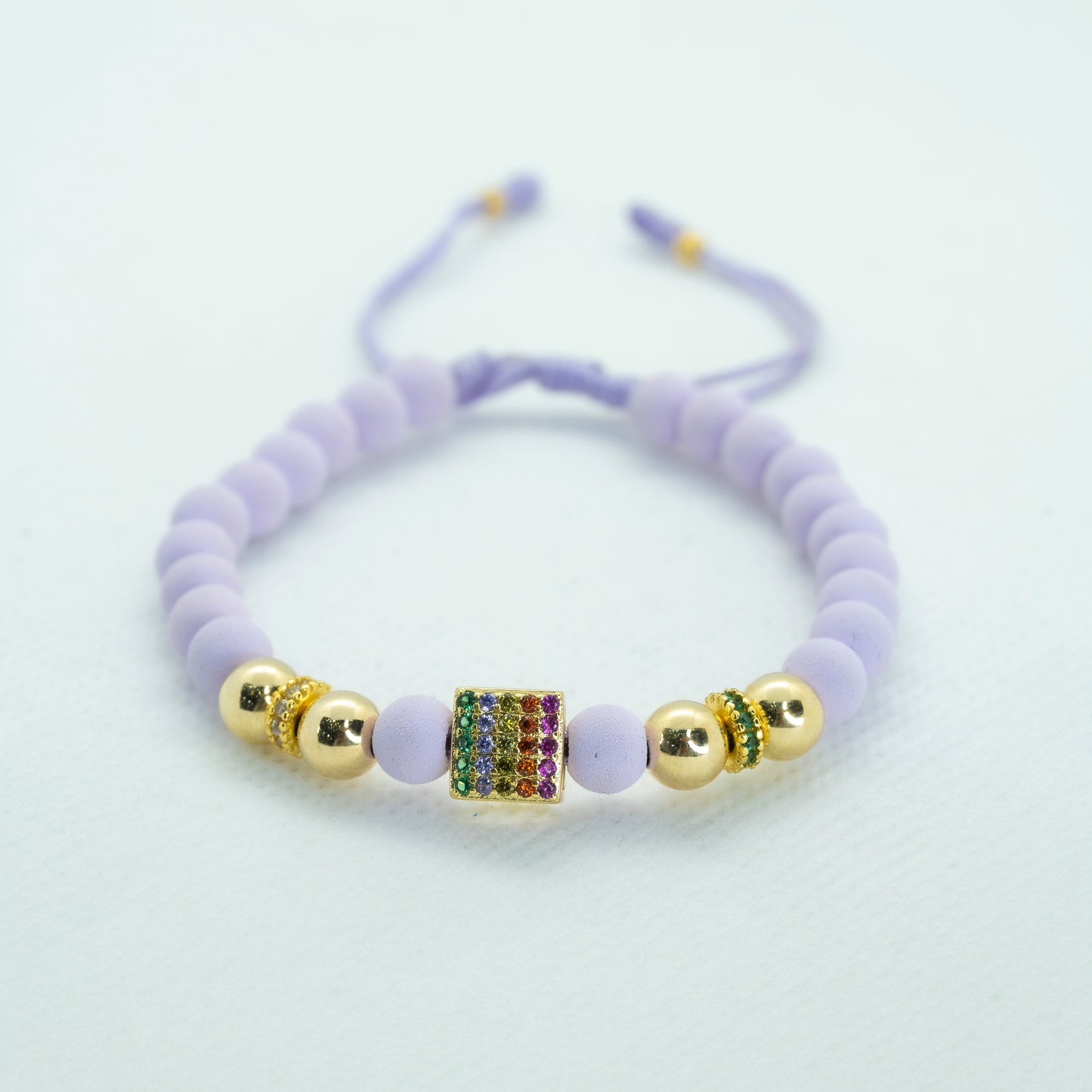 PULSERA CON NEOPRENO DIJE RONDEL CIRCONES