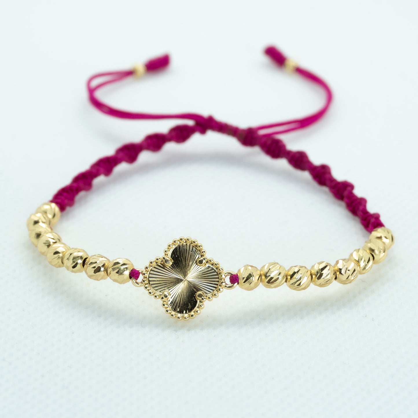 PULSERA TEJIDA VC FUCSIA