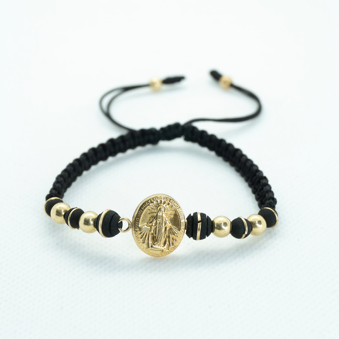 PULSERA TEJIDA CON NEOPRENO ARG NEGRO Y VIRGEN MILAGROSA