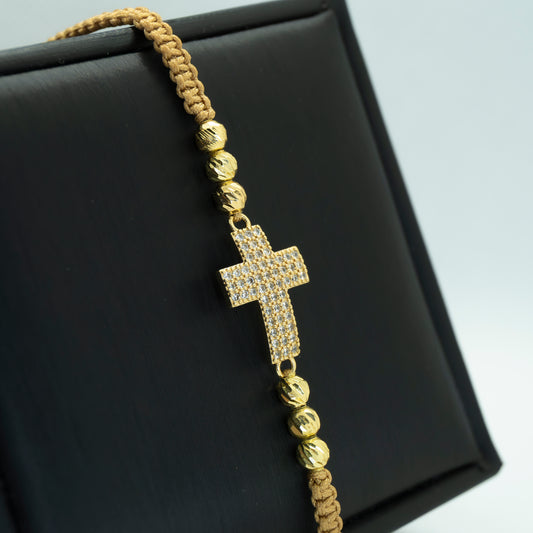 PULSERA TEJIDA CON DIJE CRUZ CIRCONES