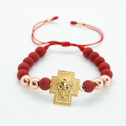 PULSERA TEJIDA CON NEOPRENO DIJE CRUZ LEON