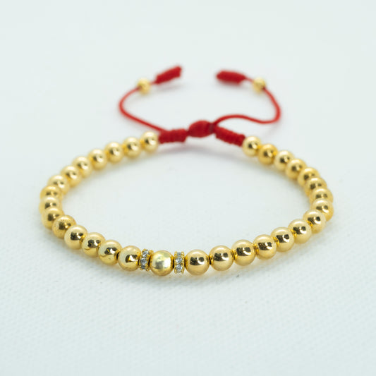PULSERA TEJIDA CON BALIN LISO