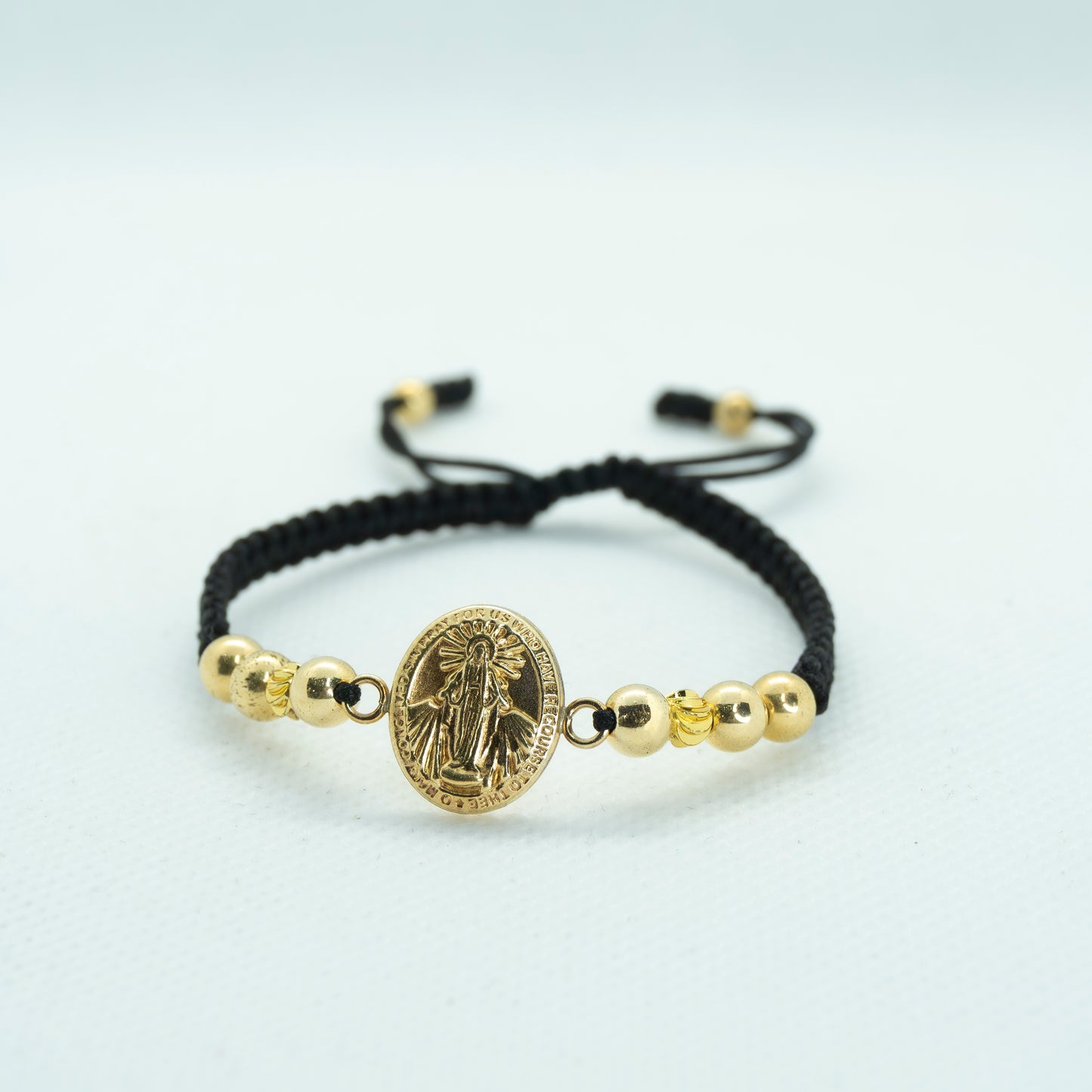 PULSERA TEJIDA CON DIJE VIRGEN MILAGROSA