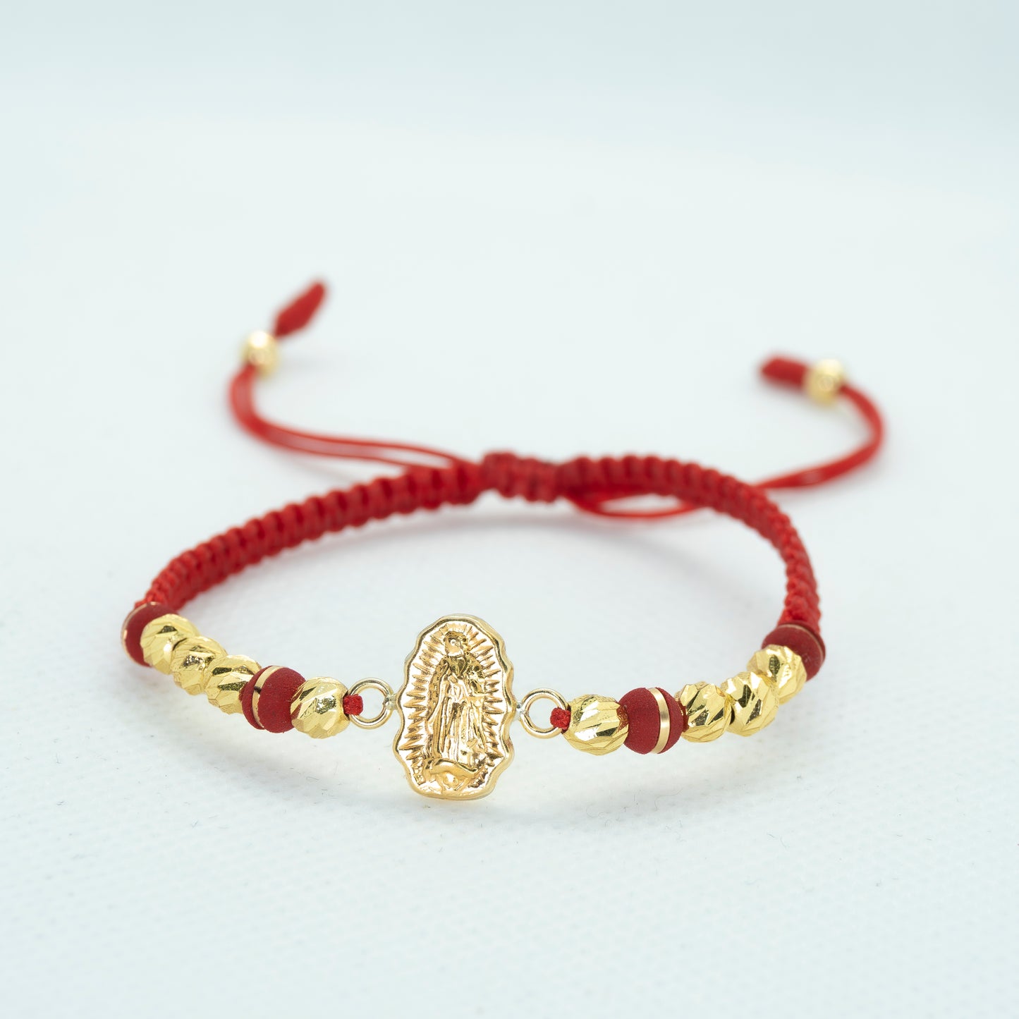 PULSERA TEJIDA CON DIJE TALLADO VIRGEN DE GUADALUPE