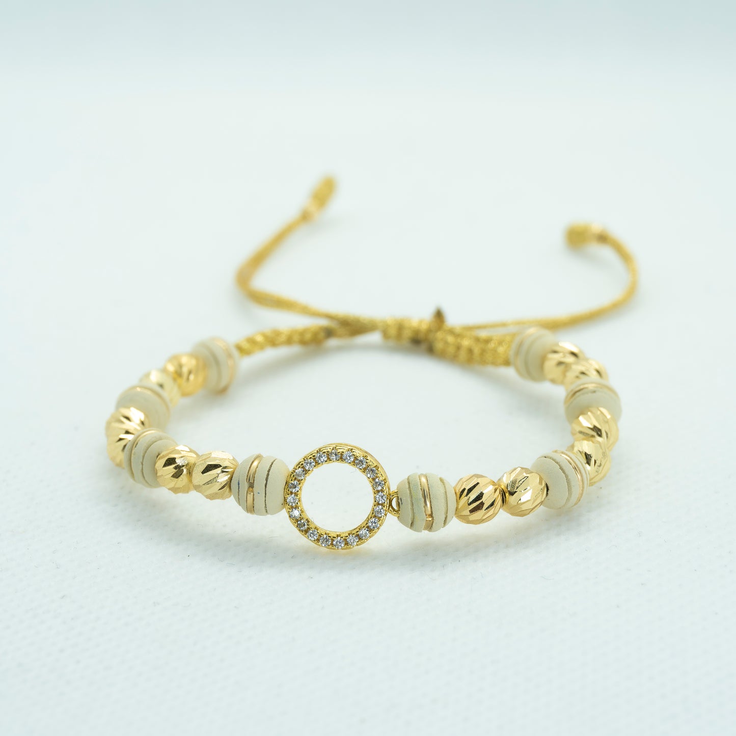 PULSERA TEJIDA NEOPRENO ARG. CON DIJE ARO CIRCONES
