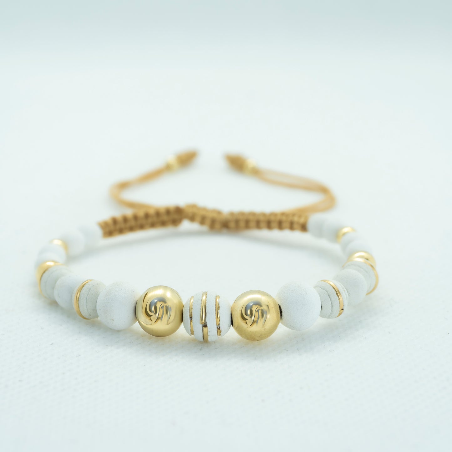 PULSERA TEJIDA CON NEOPRENO ARGOLLLADO  2 BALINES