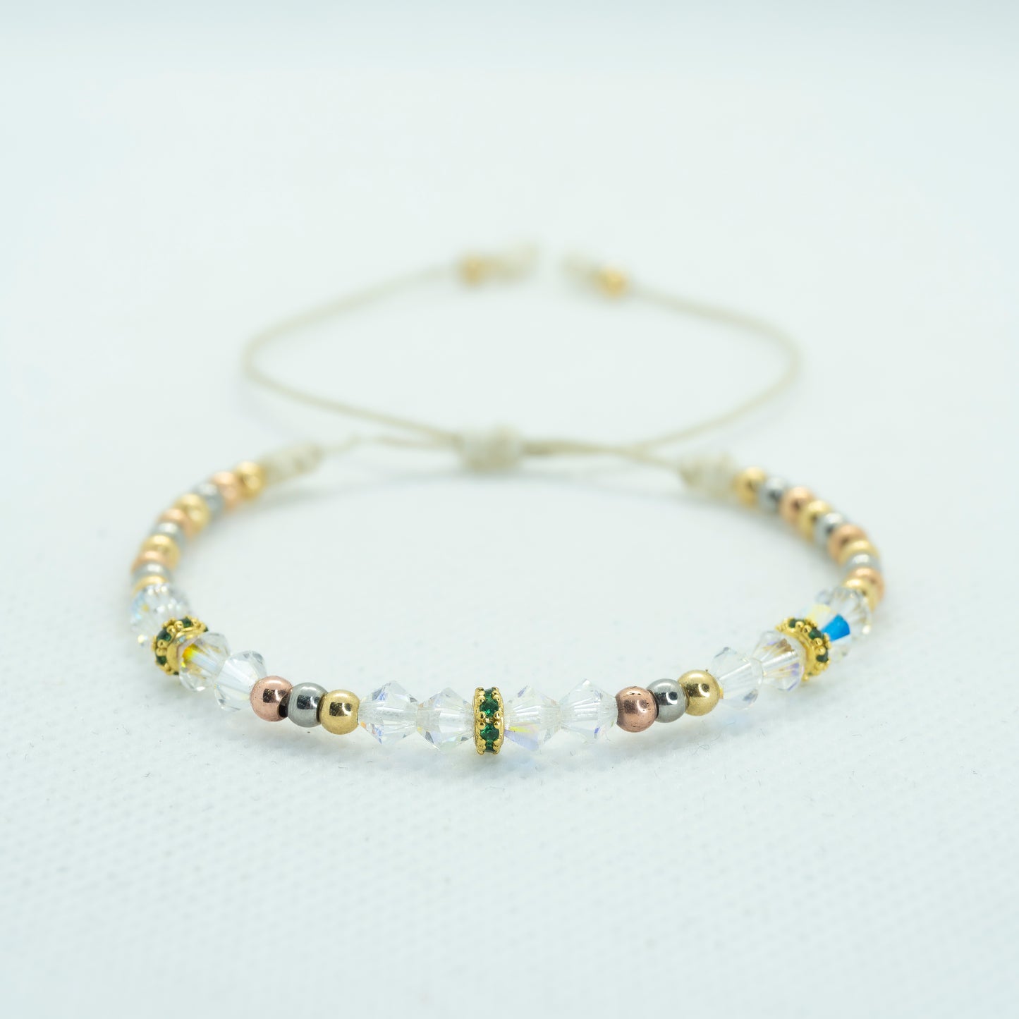 PULSERA TEJIDA 3 OROS CON RONDELES CIRCON V.
