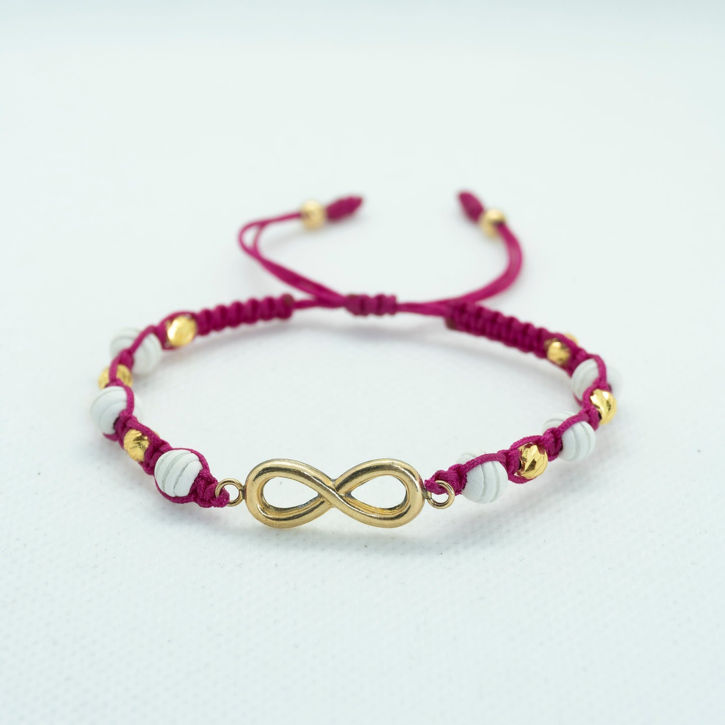 PULSERA TEJIDA CON BALIN NEOPRENO Y DIJE INFINITO