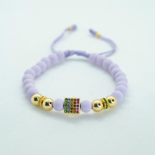PULSERA CON NEOPRENO  DIJE RONDEL CIRCONES