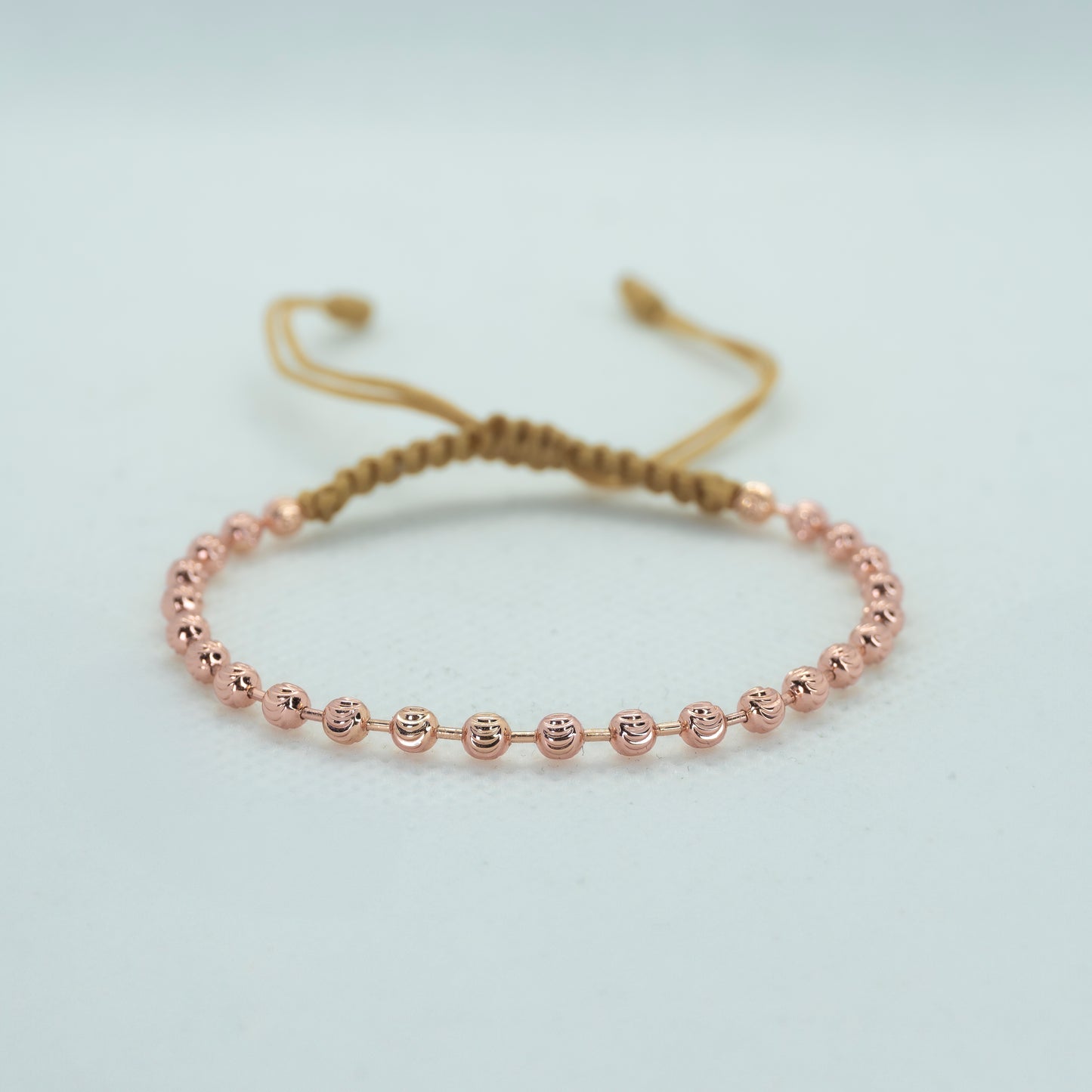 PULSERA TEJIDA CON BALIN DIAMANTADO