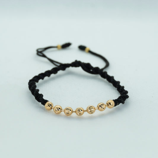 PULSERA TEJIDA CON BALIN DIAMANTADO AMARILLO