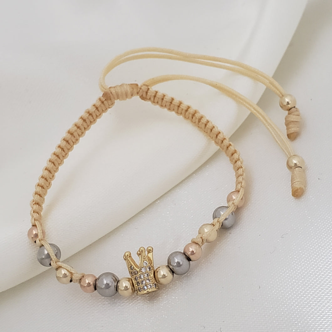 Brazalete con herraje de corona y balin 4 mm, acero 5 mm.