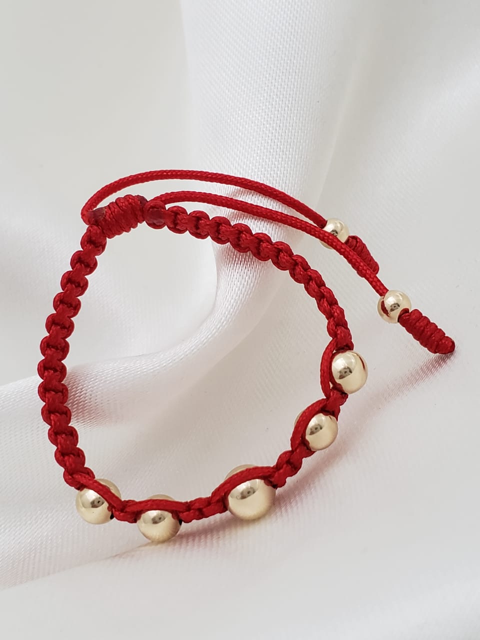 Brazalete tejido para niño con balin liso 6 y 5 mm.